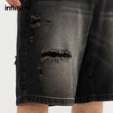 INFLATION Black Ripped Jorts